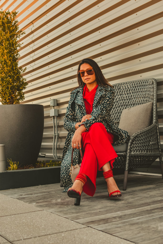 I am wearing a red pant and red blouse set with a pair of read sandals and a printed trench. this is my office look, street style look, spring outfit. Myriad Musings, saumya shiohare 