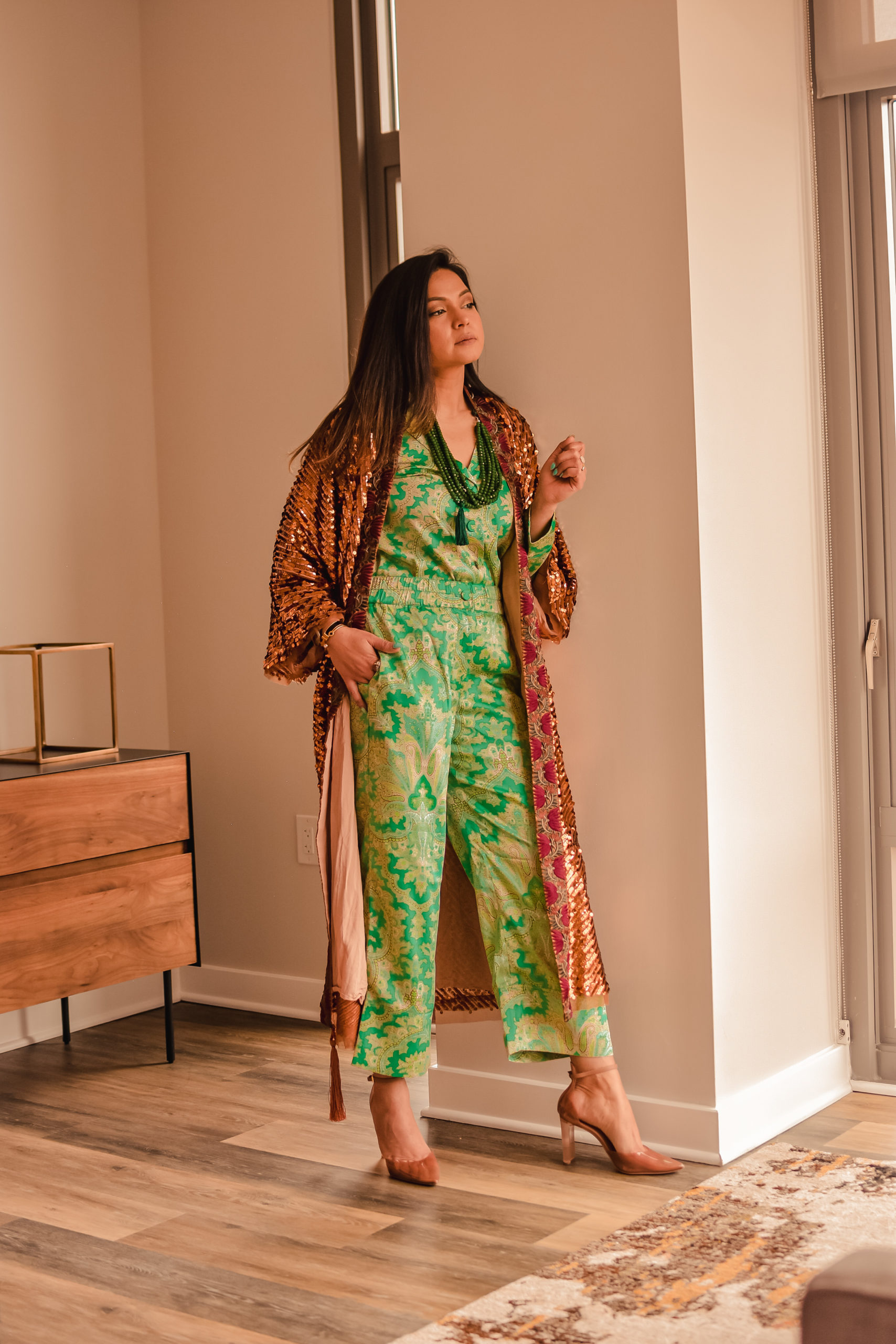 I am wearing a matching set which has pants and blouse. It is a paisley print set from J crew and is called the rattti collection. I teamed it up with a heels and a bag for day look and a sequin kimono for a night look. Saumya Shiohare, Myriad Musings 