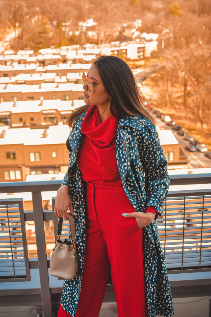 I am wearing a red pant and red blouse set with a pair of read sandals and a printed trench. this is my office look, street style look, spring outfit. Myriad Musings, saumya shiohare 